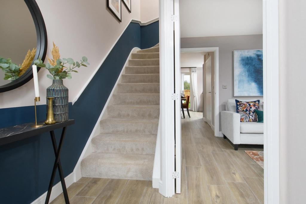 A separate entrance hallway welcomes you in The...