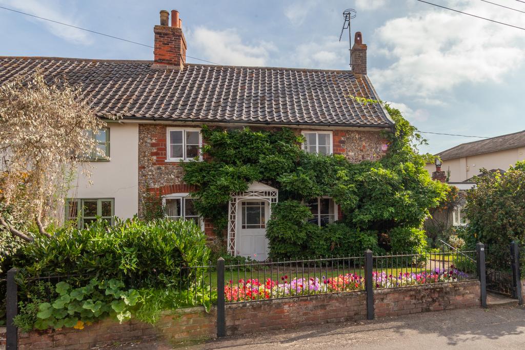 A heavily extended semi detached cottage situated