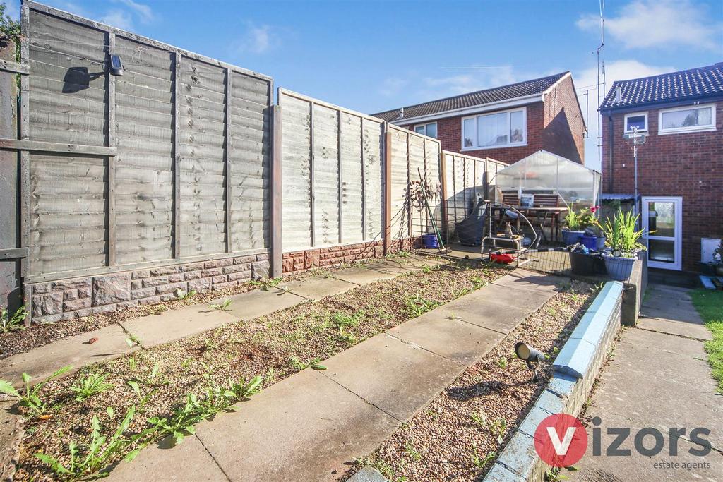 Parking area in rear garden