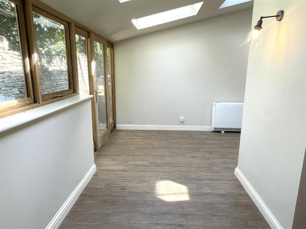 L shaped Dining Room and Study Area