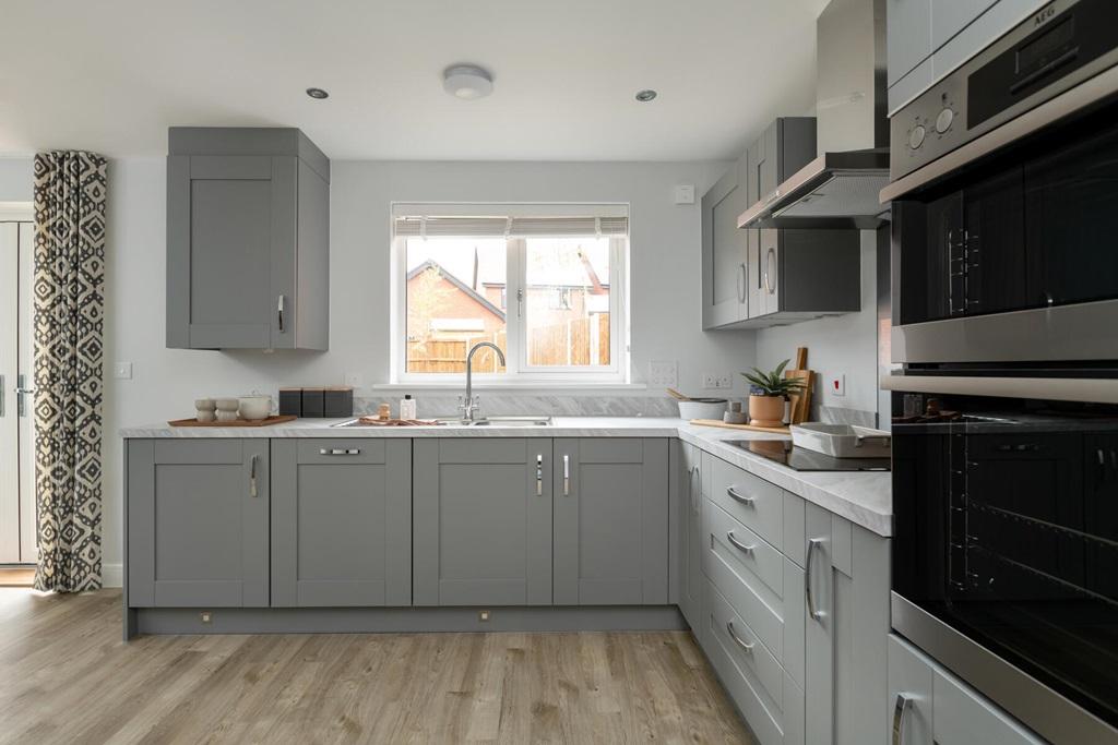 The large kitchen features ample storage