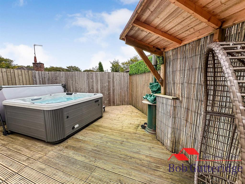 SIDE BBQ & HOT TUB AREA