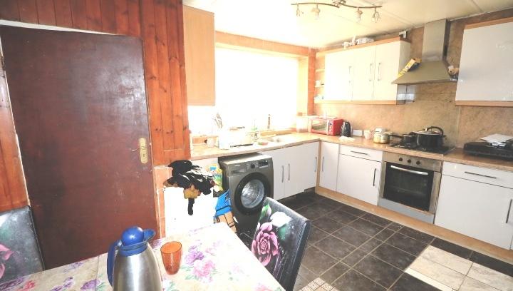 Three Bedroom Mid Terraced House For Sale in Tott