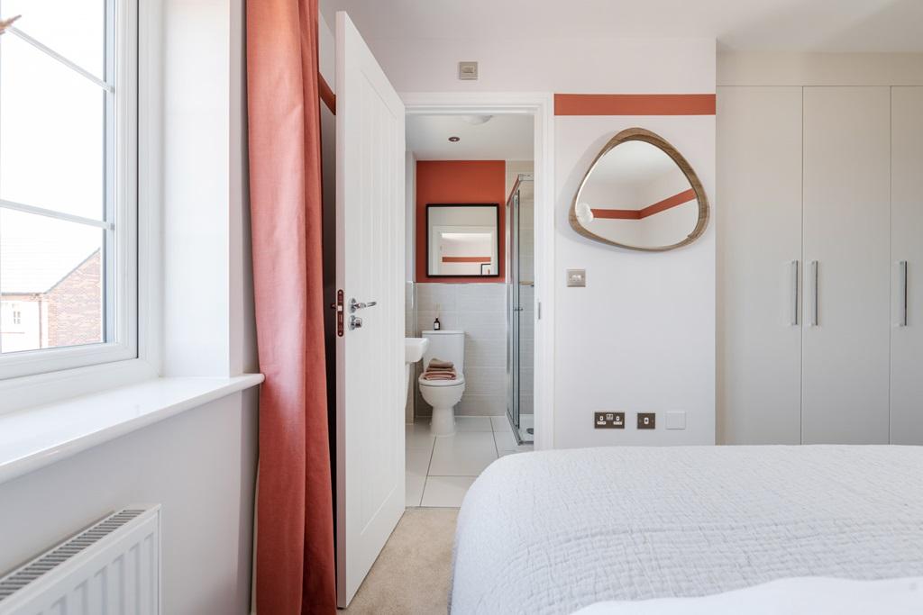 A handy en-suite shower rooms sits off the main...