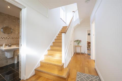 24 Wessex Avenue, London, SW19 3DT