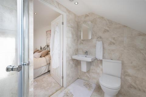 24 Wessex Avenue, London, SW19 3DT