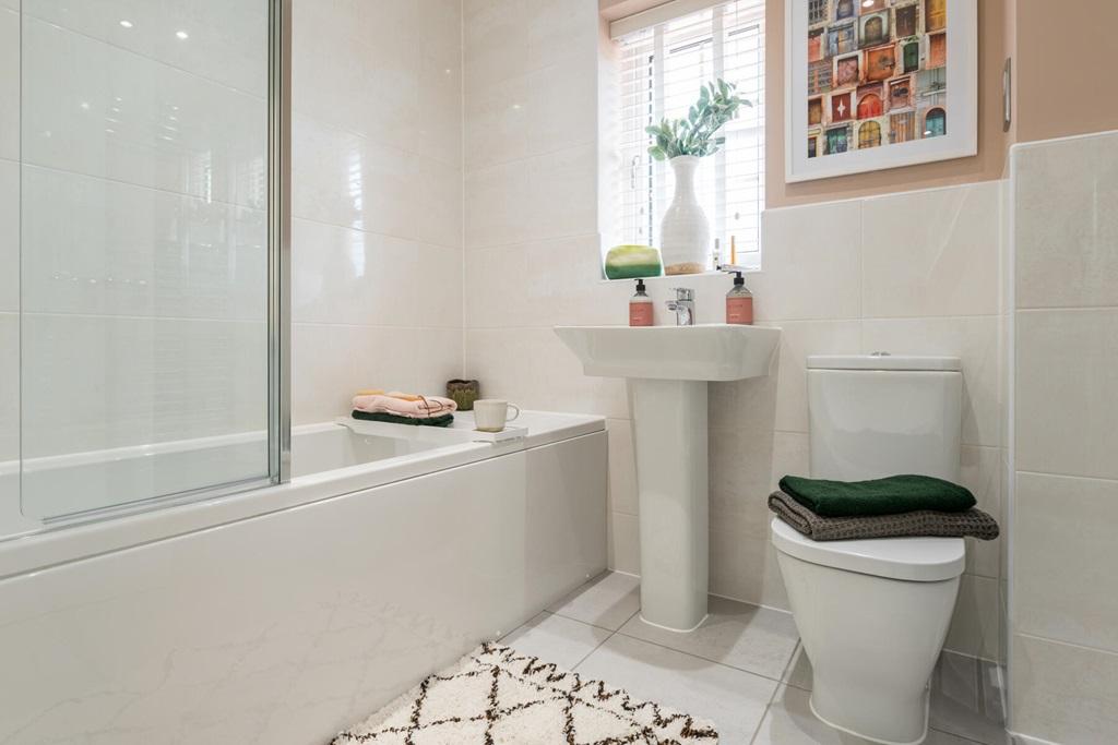 A family bathroom completes the home