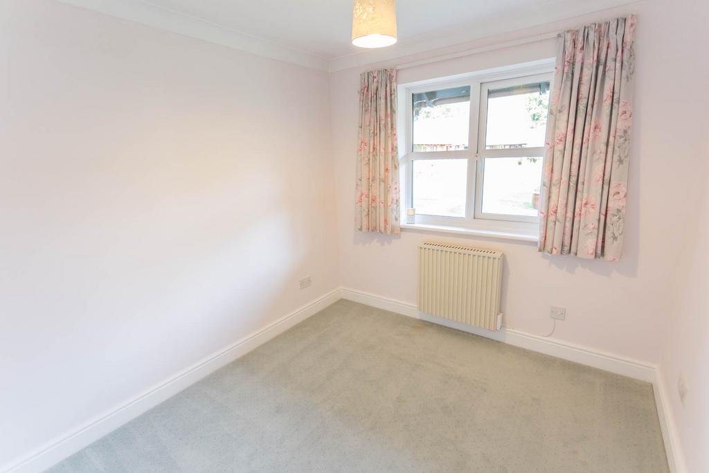 Bedroom 2 with wardrobes