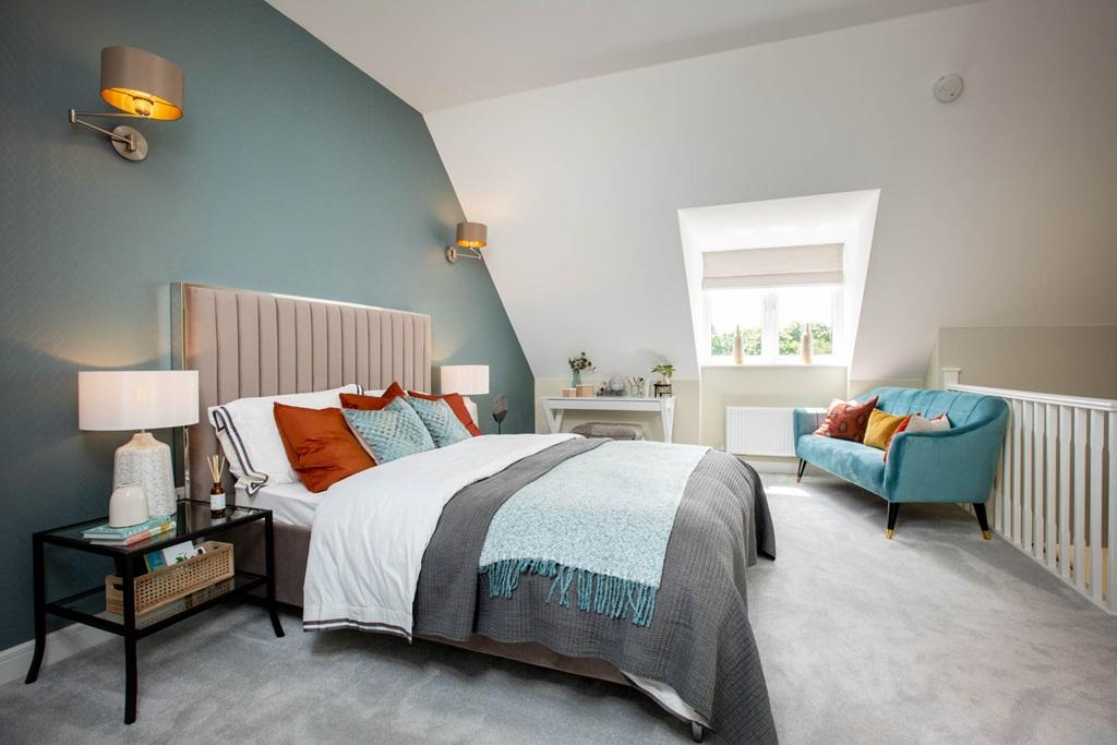 King-size bedroom enjoys privacy on the second...