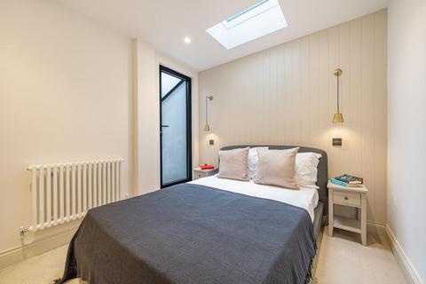 Flat 1, 86a Quicks Road, London, SW19 1EX