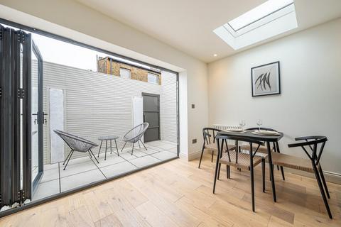 Flat 1, 86a Quicks Road, London, SW19 1EX