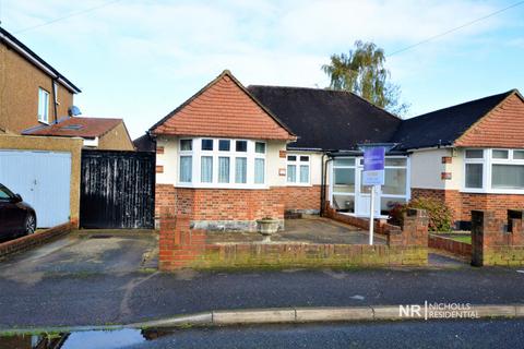 77 Rhodrons Avenue, Chessington, KT9 1AY