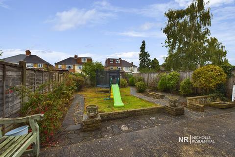 77 Rhodrons Avenue, Chessington, KT9 1AY