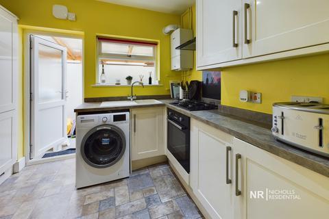 77 Rhodrons Avenue, Chessington, KT9 1AY