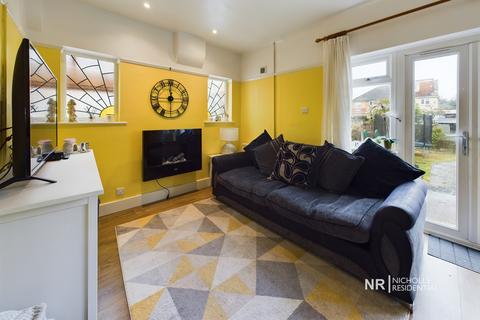 77 Rhodrons Avenue, Chessington, KT9 1AY