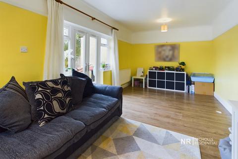 77 Rhodrons Avenue, Chessington, KT9 1AY
