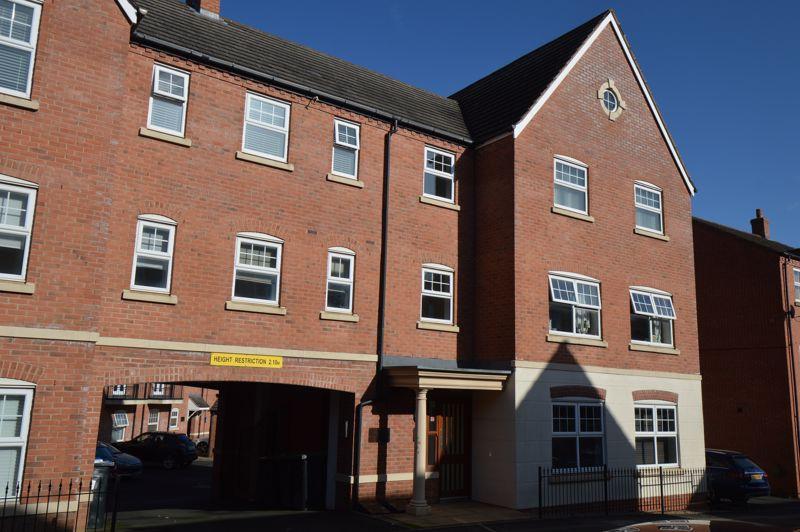 FRONT & ENTRANCE TO