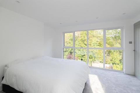 15 Bentsbrook Road, North Holmwood, Dorking, RH5 4HW