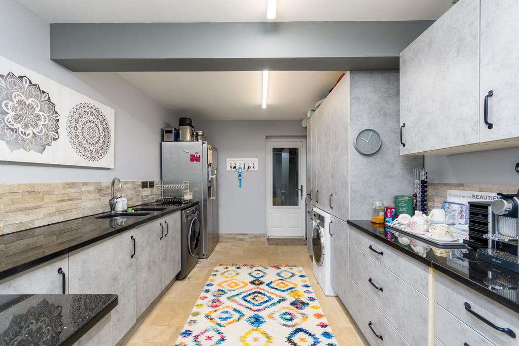 Secondary kitchen/utility room