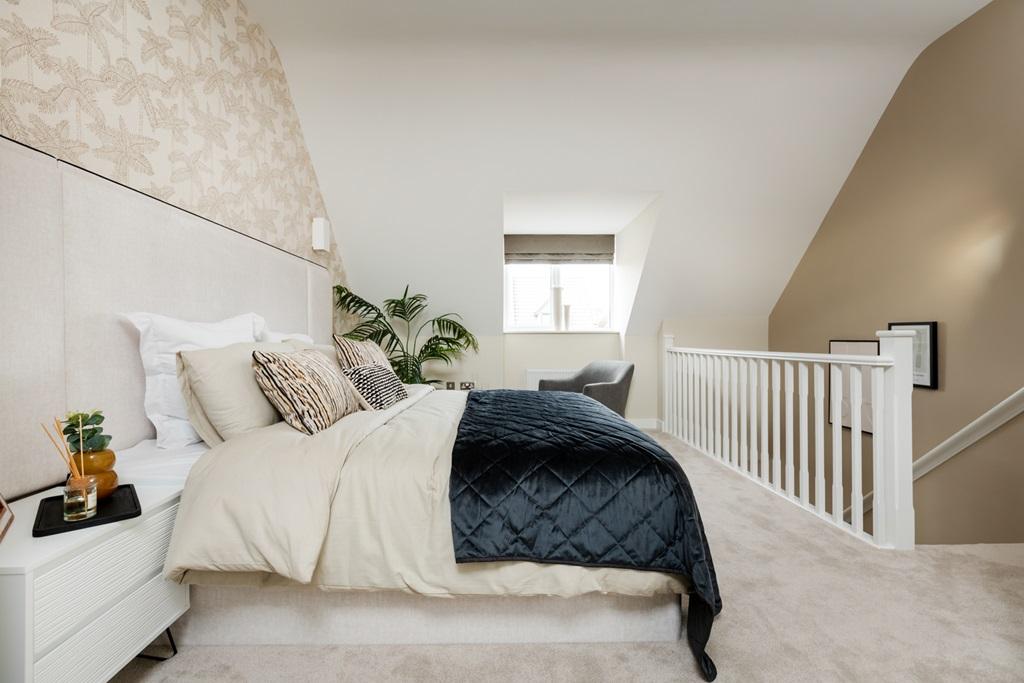Tall ceilings and an open staircase make this...