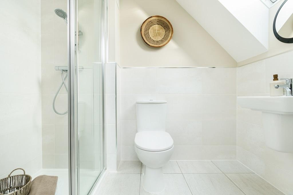 Bedroom 1 benefits from an en-suite shower room