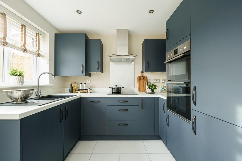 The kitchen features ample storage