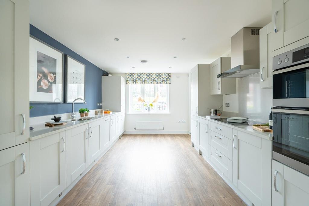 A Taylor Wimpey kitchen makes meal preparation...