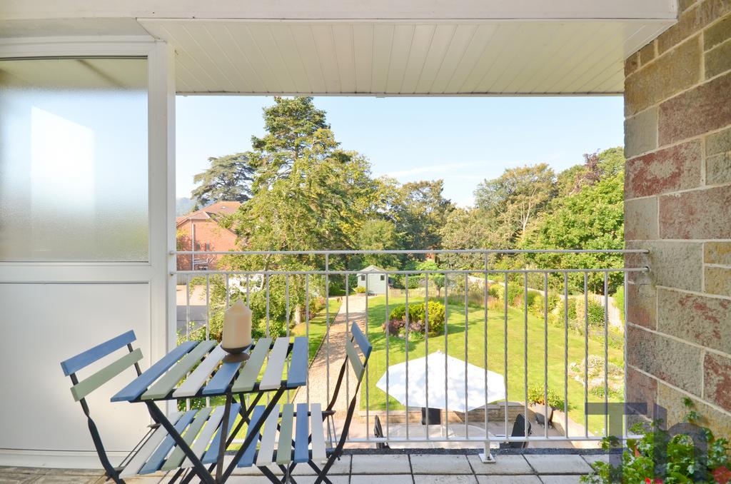 Balcony with garden views