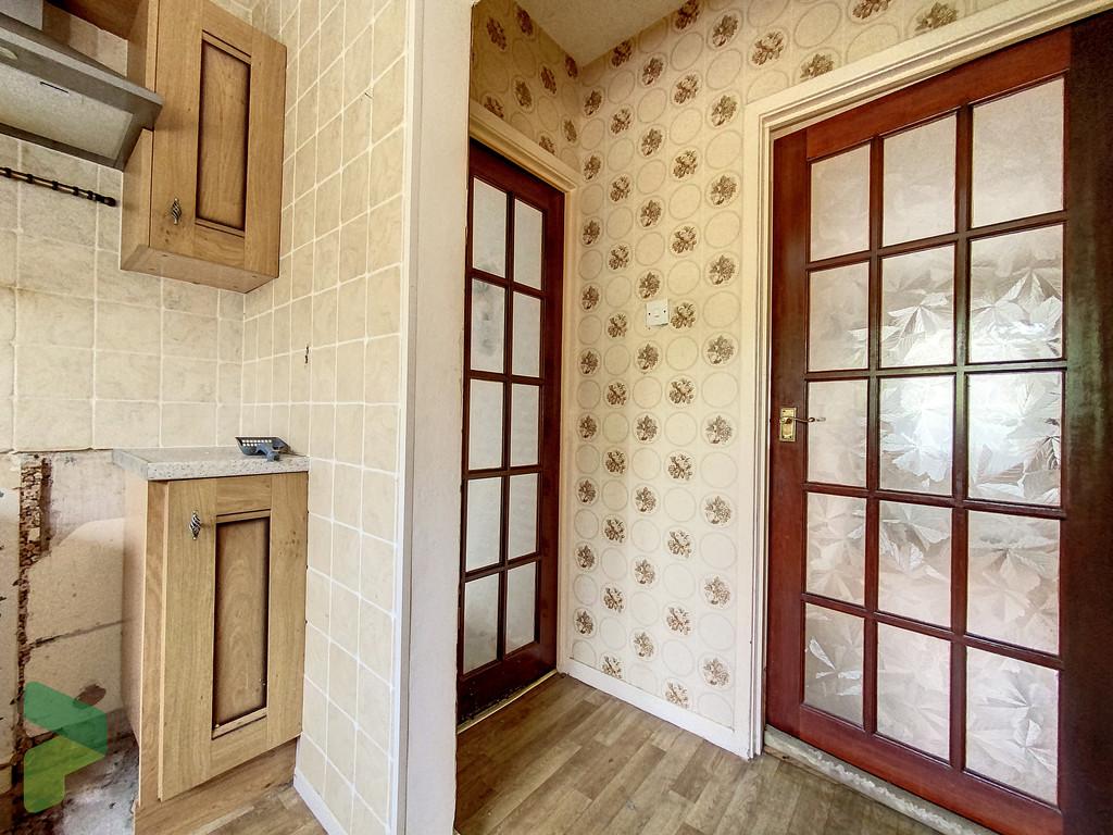 Kitchen through to Entrance and Dining