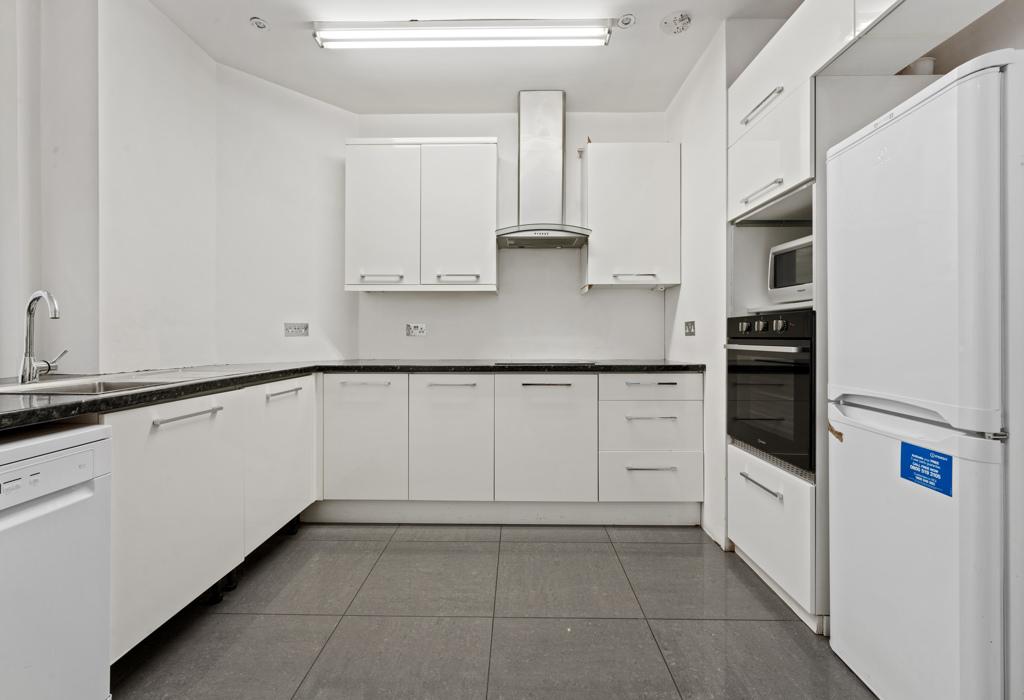 Kitchen with fitted units and appliances