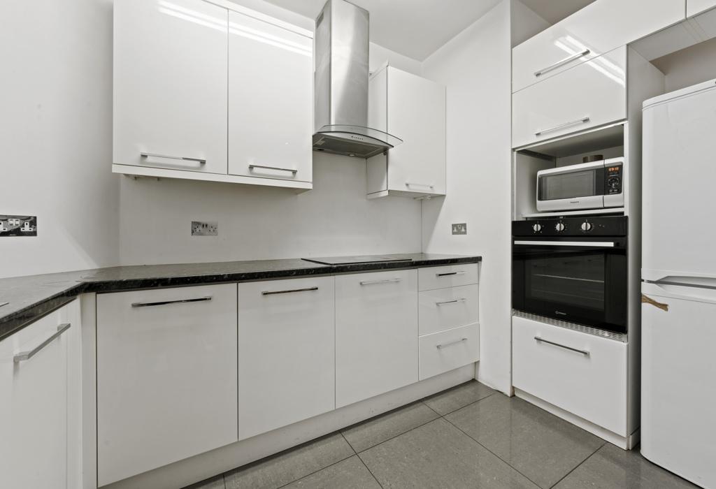 Kitchen with fitted units and appliances