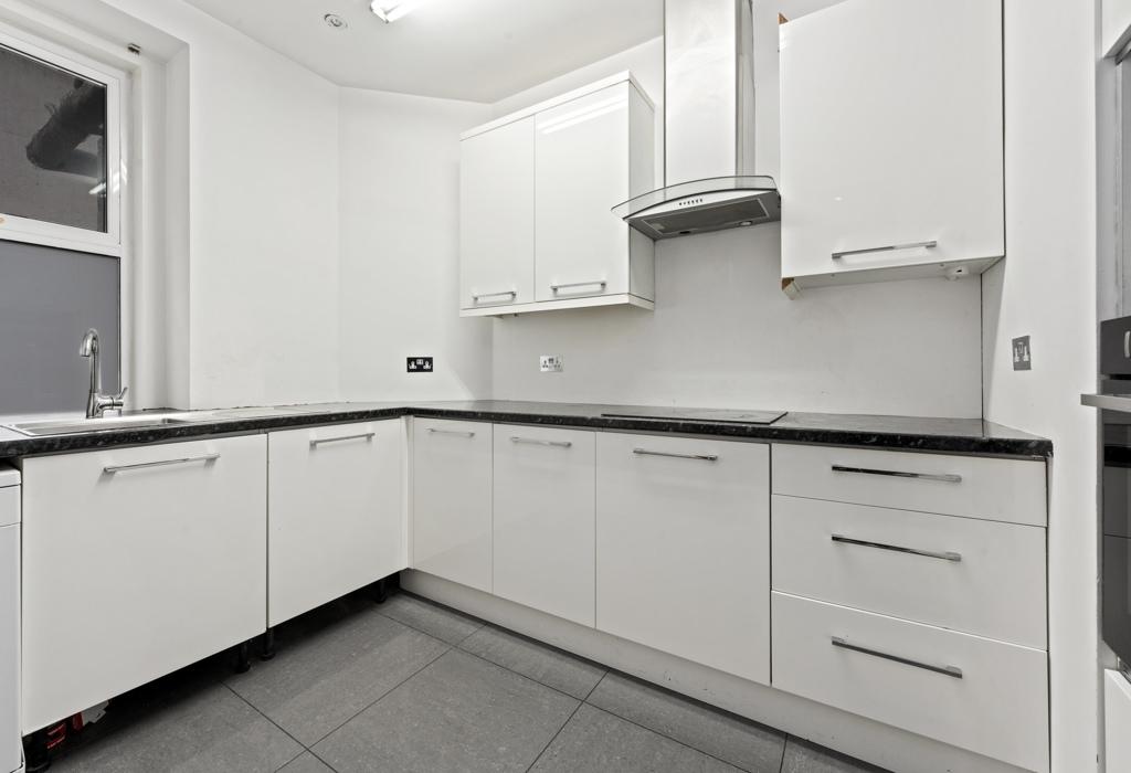 Kitchen with fitted units and appliances