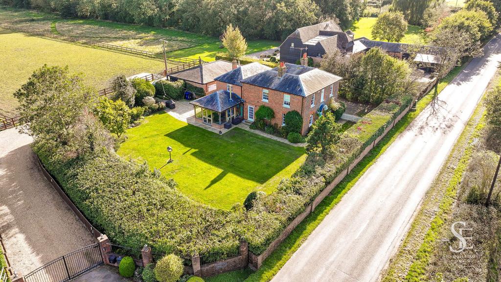 Aerial View of House with Gated Entrance