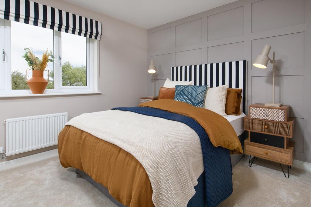A spacious double bedroom with space for storage