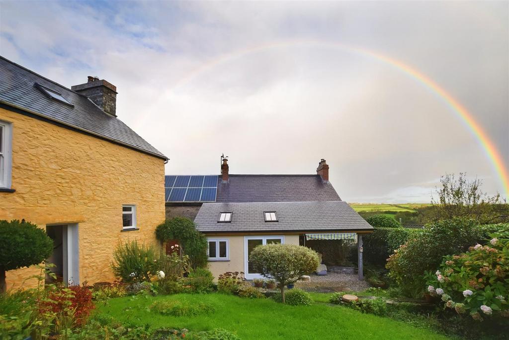 Rainbow over House