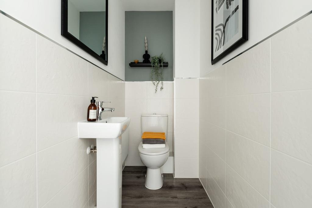 The downstairs toilet adds convenience