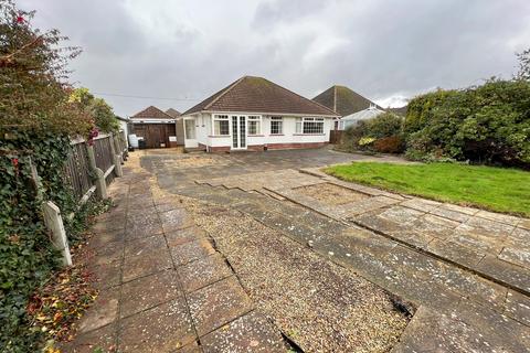 2 bedroom detached bungalow for sale, Seafield Road, Barton On Sea, New Milton, Hampshire. BH25 7JS