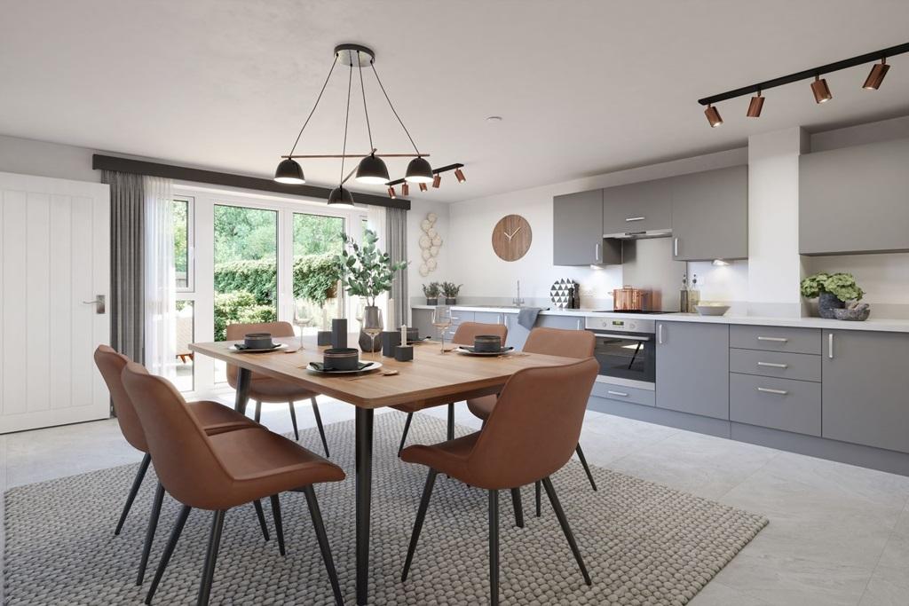 A modern kitchen with French doors opening to...