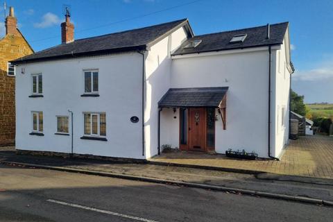 4 bedroom detached house for sale, High Street, Ravensthorpe, Northampton NN6 8EH