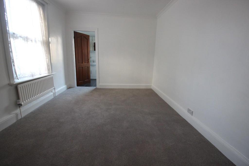 Bedroom leading to bathroom.JPG