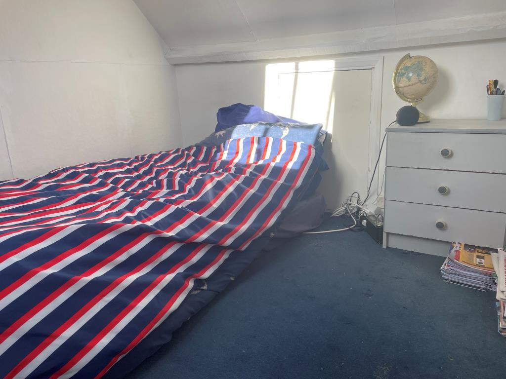 Attic room with sloping ceilings