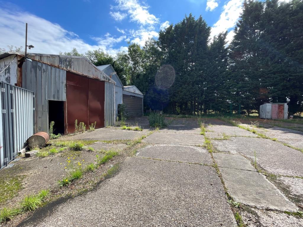 View of yard and entrance to the lock up units