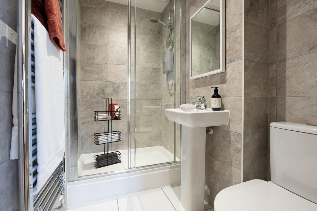 An en-suite shower room away from the family