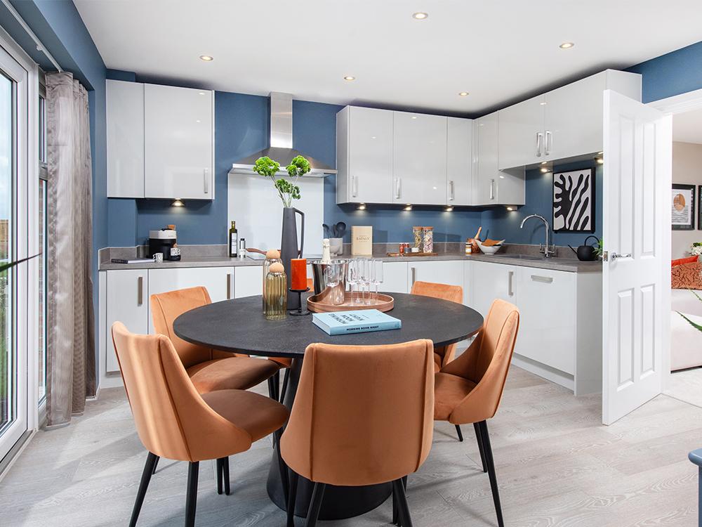 Kitchen/dining area with French doors to the...