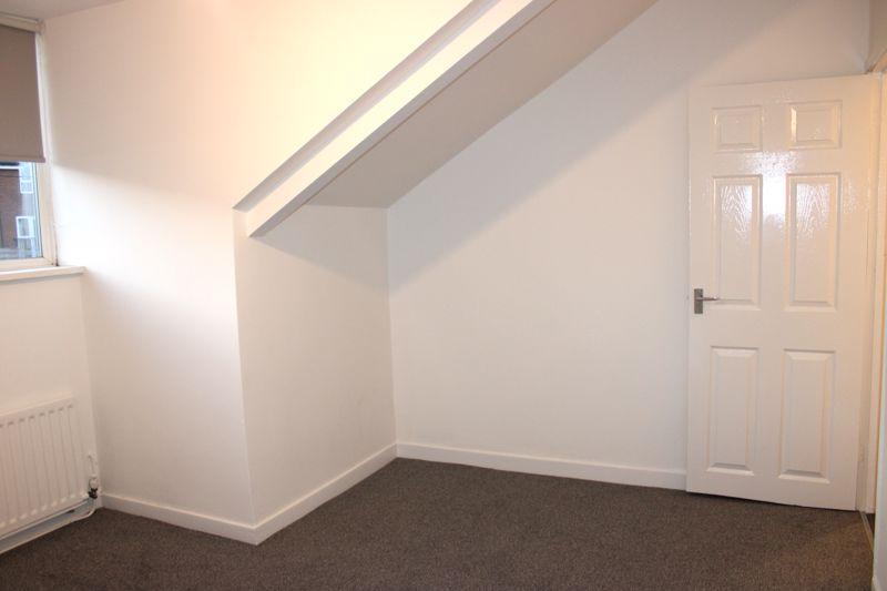Upper rear bedroom