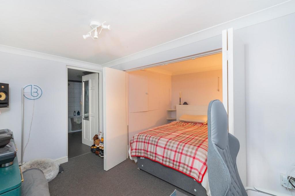 KLAWLAIREPMI04 - Basement Bedroom A.jpg