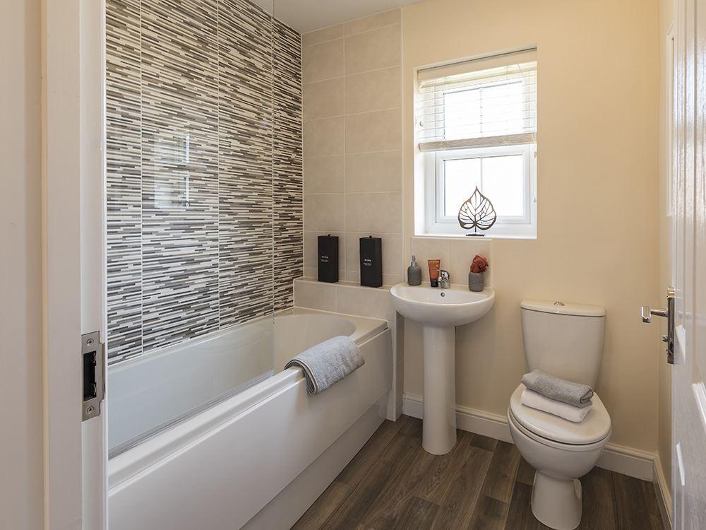 Extensively tiled bathroom