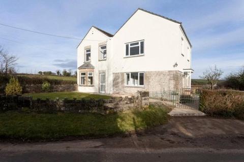 undefined, Detached farmhouse situated in an excellent countryside village.