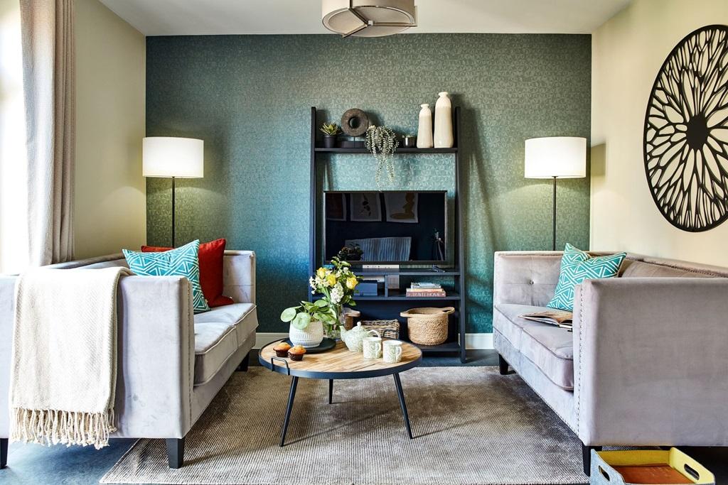 A bright living room with space for family and...