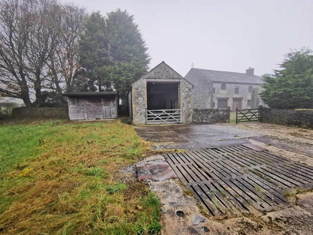 Detached stone and tiled Building